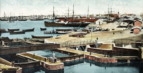 Port of Alexandria. Ships and boats at anchor in Alexandria Port. Alexandria, Egypt, circa 1920. Alexandria, Alexandria, Egypt, Northern Africa, Africa.
