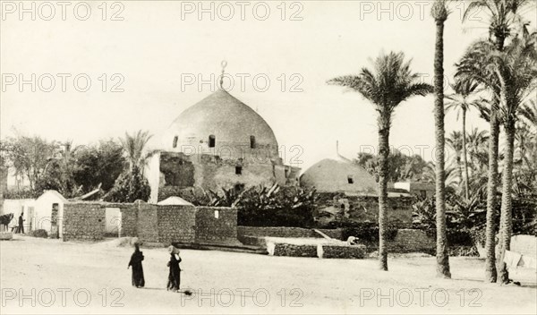 Mosque in old Cairo. A dome-shaped mosque located in the old part of Cairo city. Cairo, Egypt, circa 1925. Cairo, Cairo, Egypt, Northern Africa, Africa.