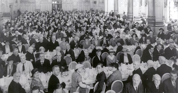 Anti-slavery fundraising dinner. English anti-slavery campaigners pack out a dining hall for a fundraising dinner. England, circa 1930. England (United Kingdom), Western Europe, Europe .