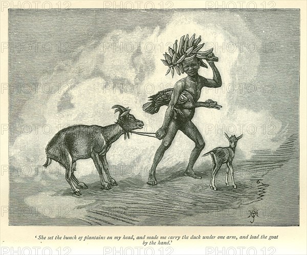 Sudanese slave boy. A book illustration depicts a young slave at work. A printed caption beneath the image reads: 'She set the bunch of plantains on my head, and made me carry the duck under one arm, and lead the goat by the hand'. Sudan, circa 1889. Sudan, Eastern Africa, Africa.