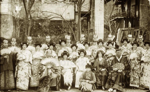 Cast of 'The Mikado', 1928. Members of the Gibraltar Operatic & Dramatic Society pose in full costume following a performance of 'The Mikado', a comic opera written by Gilbert and Sullivan in 1885. An original caption comments that many of the cast were more usually employed at the Gibraltar dockyards. Gibraltar, November 1928. Gibraltar, Gibraltar, Gibraltar, Mediterranean, Europe .