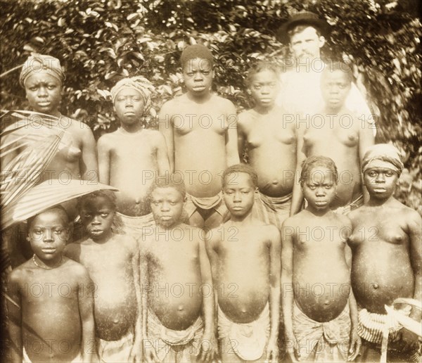 Girls from Bioko. A group of semi-naked girls from Bioko line up for the camera. Bioko, Equatorial Guinea, circa 1930., Bioko Norte, Equatorial Guinea, Central Africa, Africa.