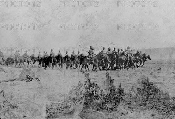 The Fifth Dragoon Guards in South Africa. The Fifth Dragoon Guards, a cavalry regiment of the British Army, ride across an open landscape during the Second Boer War (1899-1902). South Africa, circa 1900. South Africa, Southern Africa, Africa.