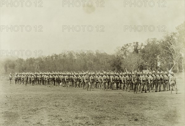 The Second Devonshire Regiment. The Second Devonshire Regiment of the British Army, led by Captain Davies, marches in formation across flat, rural terrain. The company was involved in a campaign to suppress Burmese rebels in Wuntho State (today known as the Sagaing Division). An original caption comments that they marched "from Shwebo to Kawlin: a distance of 98 miles in five days". Sagaing, Burma (Myanmar), 1891., Sagaing, Burma (Myanmar), South East Asia, Asia.