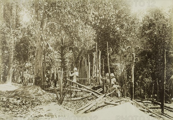 Capture of Kyaing-Kwintaung. Soldiers of the Second Devonshire Regiment, led by General Wolseley, aim rifles as they re-enact their successful capture of the Kyaing-Kwintaung stockade. The stronghold was seized from the Saopha of Wuntho and his rebel supporters, who opposed British attempts to annex areas of Burma (Myanmar). Sagaing, Burma (Myanmar), 1891., Sagaing, Burma (Myanmar), South East Asia, Asia.