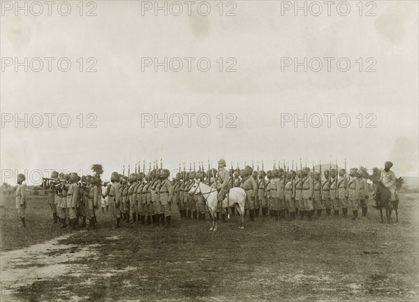The Shwebo Battalion of Military Police. Indian officers from the Shwebo Battalion of Military Police stand to attention, their guns held upright. Led by Captain Keary, the company supported the British Army in a campaign to suppress Burmese rebels in Wuntho State (today known as the Sagaing Division). Sagaing, Burma (Myanmar), 1891., Sagaing, Burma (Myanmar), South East Asia, Asia.