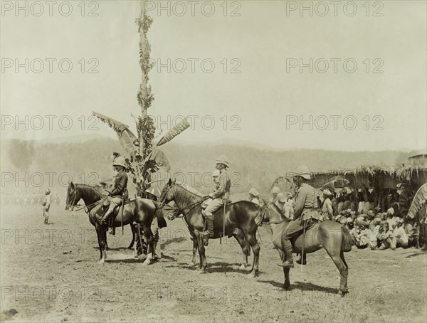 General Wolseley inspects troops. General Wolseley and other senior British Army officers sit mounted on horseback as they inspect their troops. The group of Burmese men huddled together behind them may be rebels captured by the British during a conflict at Wuntho. Sagaing, Burma (Myanmar), 1891., Sagaing, Burma (Myanmar), South East Asia, Asia.