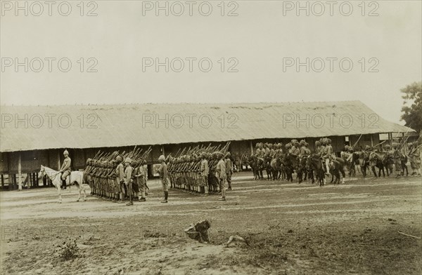 The Ye-U Battalion of Military Police. Indian officers from the Ye-U Battalion of Military Police stand to attention, their guns held upright. Led by Captain Hutchinson, the company supported the British Army in a campaign to suppress Burmese rebels in Wuntho State (today known as the Sagaing Division). Sagaing, Burma (Myanmar), 1891., Sagaing, Burma (Myanmar), South East Asia, Asia.