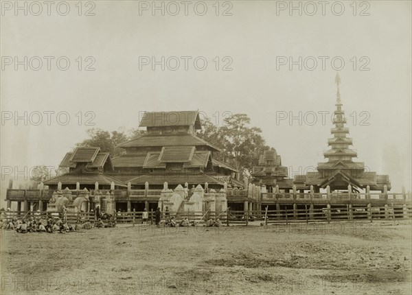 The palace at Wuntho. Side view of Wuntho Palace, raised off the ground on wooden stilts and distinguished by its pagoda-style roof. This scene was captured shortly after British forces took control of the town following a conflict with Burmese rebels. Wuntho, Burma (Myanmar), 1891. Wuntho, Sagaing, Burma (Myanmar), South East Asia, Asia.