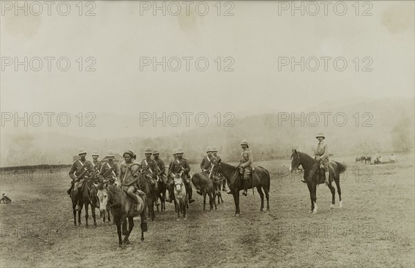 Wolseley and Smyth follow a scout. A local Burmese scout leads General Wolseley, Major Smyth and other military officers into the countryside on horseback. Both officers led British Army troops against Burmese rebels during a conflict at Wuntho. Sagaing, Burma (Myanmar), 1891., Sagaing, Burma (Myanmar), South East Asia, Asia.