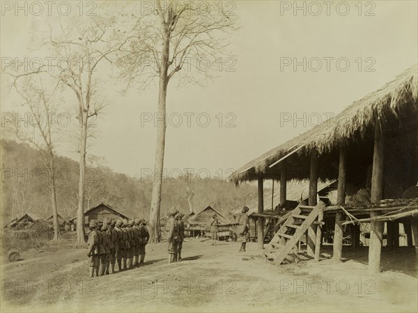 Guard house on the Morgandine Pass. Turbaned Indian soldiers stand outside a guard house, situated in a village on the Morgadine Pass. These men were part of forces supporting the British Army in a campaign to suppress Burmese rebels in Wuntho State (today known as the Sagaing Division). Sagaing, Burma (Myanmar), 1891., Sagaing, Burma (Myanmar), South East Asia, Asia.