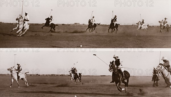British officers play polo at Omdurman. A number of British military officers ride horses during a polo game in a wide, open space. Omdurman, Sudan circa 1910. Sudan, Eastern Africa, Africa.