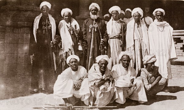 Sheikhs of Kordofan. Portrait of a group of Sheikhs from the Kordofan region of Sudan, wearing traditional Arab dress and turbans. Korodfan (probably West Kurdufan State), Sudan, circa 1910., West Kurdufan, Sudan, Eastern Africa, Africa.
