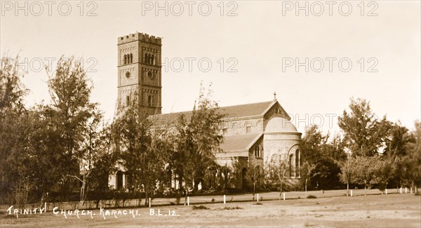 Trinity Church, Karachi. Exterior view of Trinity Church in Karachi, featuring a square tower at its east end, and a projecting apse at its west. Karachi, India (Pakistan), circa 1910. Karachi, Sindh, Pakistan, Southern Asia, Asia.