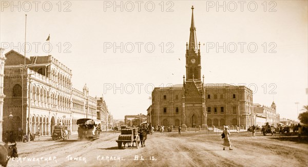 Merewether Memorial Tower, Karachi. View of Merewether Memorial Tower in Karachi, built to commemorate Sir William Lockyer Merewether (1825-1880), Commissioner of Sind between 1898 and 1877. The decorative clock tower features an English-style spire and a round panel decorated with a six-pointed star. Karachi, India (Pakistan), circa 1910. Karachi, Sindh, Pakistan, Southern Asia, Asia.