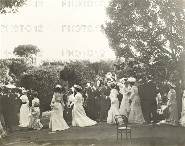The Lawleys greet arriving guests. Sir Arthur and Lady Annie Lawley greet guests at a New Year's garden party organised by the Earl of Hopetoun, Governor General of Australia. Perth, Australia, January 1902. Perth, West Australia, Australia, Australia, Oceania.