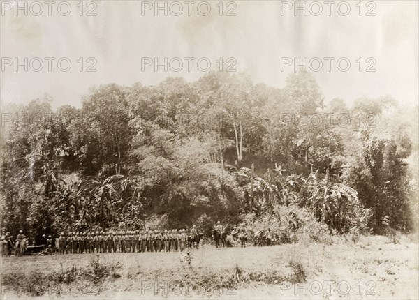 After the capture of Kyaing-Kwintaung. General Wolseley and soldiers of the Second Devonshire Regiment stand beneath the Kyaing-Kwintaung stockade following its capture. The stronghold was seized from the Saopha of Wuntho and his rebel supporters, who opposed British attempts to annex areas of Burma (Myanmar). Sagaing, Burma (Myanmar), 1891., Sagaing, Burma (Myanmar), South East Asia, Asia.