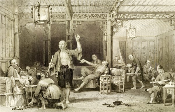 Inside a Chinese opium den. Several Chinese men recline in lounge chairs as they smoke opium through pipes inside an opium den. Although the oriental-style interior suggests a location in China, the engraving may feature a Chinese opium den in Europe where it was published. Location unknown, circa 1850.