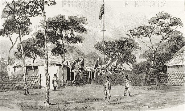 Temporary British Consulate in Nyasaland. An illustration taken from a page of 'The Graphic' newspaper depicts the temporary headquarters of the British Consulate in Nyasaland. The compound is surrounded by a fence and patrolled by an armed consular guard. Nyasaland (Malawi), circa 1889. Malawi, Southern Africa, Africa.