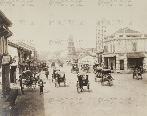 Rickshaws on South Bridge Road, Singapore. Rickshaws travel back and forth along Singapore's South Bridge Road. Singapore, Straits Settlements (Singapore), circa 1895. Singapore, Central (Singapore), Singapore, South East Asia, Asia.