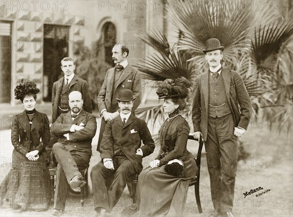 The Lawleys visit the Tennysons. Group portrait of Sir Arthur and Lady Annie Lawley (seated third from left and far left respectively) with Lord Hallam and Lady Audrey Tennyson (seated second from left and far right respectively). The Lawley's were visiting Lord Tennyson, then Governor of South Australia, en-route to Melbourne. Adelaide, Australia, circa May 1901. Adelaide, South Australia, Australia, Australia, Oceania.