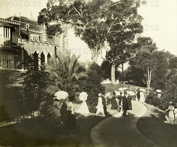 New Year's garden party at Government House, Perth. Formally dressed guests socialise in the grounds of Government House at a New Year's garden party organised by the Earl of Hopetoun, Governor General of Australia. Perth, Australia, January 1902. Perth, West Australia, Australia, Australia, Oceania.