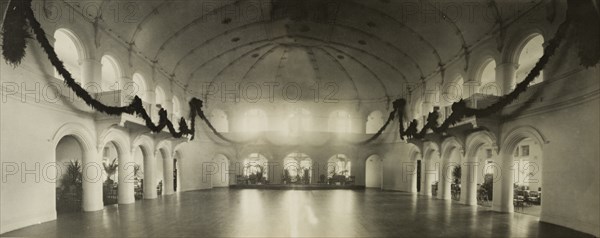 The Government House ballroom, Perth. Panoramic view of the sumptuous ballroom inside Perth's Government House. The domed ceiling is echoed through a series of arched windows and doorways that surround an immaculate dance floor. Perth, Australia, 1901. Perth, West Australia, Australia, Australia, Oceania.
