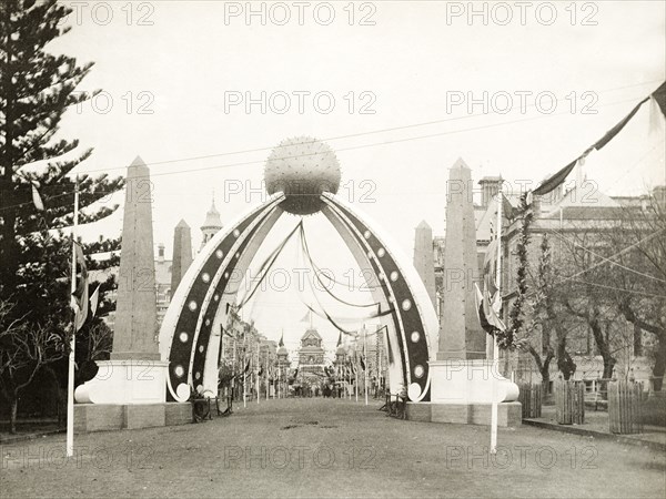 The Gold Arch at St. George's Terrace, Perth. The Gold Arch at St. George's Terrace, part of celebrations to welcome the Duke and Duchess of Cornwall and York (later King George V and Queen Mary) to Perth. Perth, Australia, July 1901. Perth, West Australia, Australia, Australia, Oceania.
