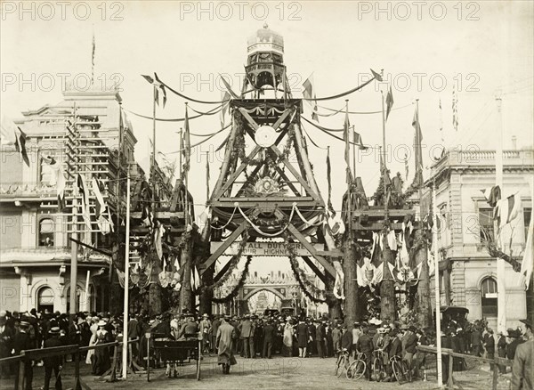 Royal welcome arch at Perth. A welcome arch at the intersection of William Street and St. George's Terrace, part of celebrations to welcome the Duke and Duchess of Cornwall and York (later King George V and Queen Mary) to Perth. Perth, Australia, July 1901. Perth, West Australia, Australia, Australia, Oceania.