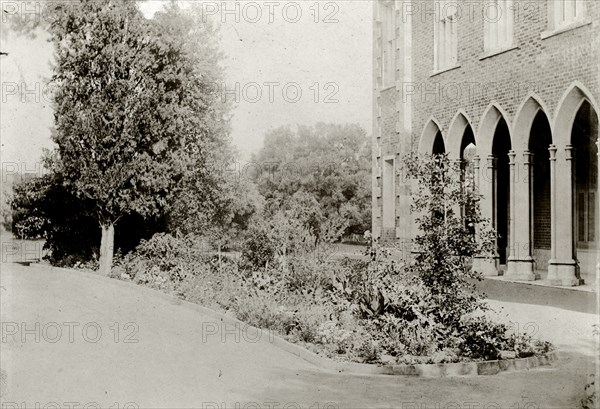 The grounds of Government House, Perth. An arched colonnade in the grounds of Perth's Government House. Perth, Australia, circa 1901. Perth, West Australia, Australia, Australia, Oceania.