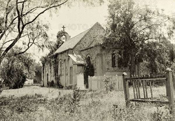 A chapel near Government House, Perth. A small stone chapel, overgrown with ivy, near Perth's Government House. Perth, Australia, circa 1901. Perth, West Australia, Australia, Australia, Oceania.