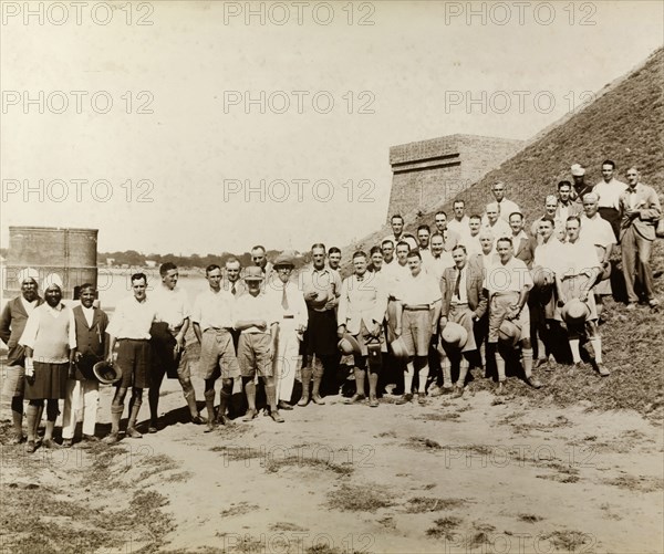 The Burma Association of Engineers. The Burma Association of Engineers (comprising irrigation, military, railway, road and building engineers) pays a visit to the construction site of Ava Bridge, built by the British to connect Mandalay and Sagaing. Mandalay, Burma (Myanmar), circa 1931. Mandalay, Mandalay, Burma (Myanmar), South East Asia, Asia.