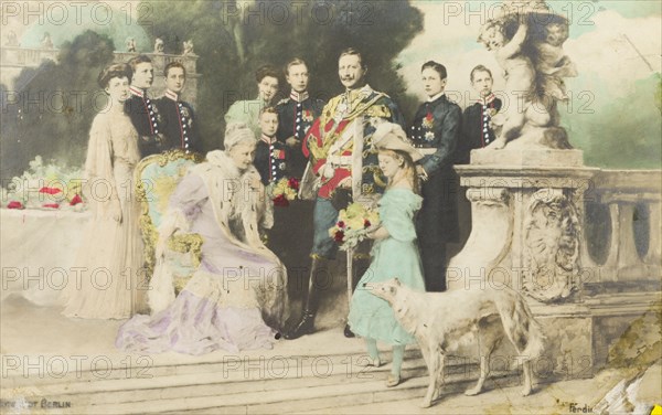 Portrait of the German royal family. Portrait of the German royal family, pictured outdoors on a terrace in the grounds of a royal residence. Kaiser Wilhelm II stands in the centre wearing full military regalia, whilst his wife, Auguste Viktoria, sits surrounded by their seven children and two daughters-in-law. Germany, 1906. Germany, Central Europe, Europe .