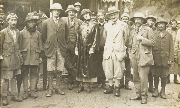 Members of the 1922 Everest expedition team. Group portrait of members of the 1922 Everest expedition team. The British members are identified as (left to right): Colonel Edward Strutt, Captain George Finch, Lady Lytton, Major Henry Morshead and Dr. Thomas Longstaff. They stand surrounded by their team of expatriate Sherpas, who were especially selected to accompany the expedition. Darjeeling, India, 1922. Darjeeling, West Bengal, India, Southern Asia, Asia.