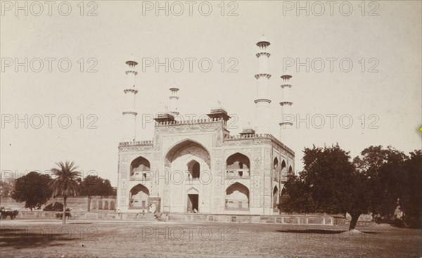 Marble gateway to Emperor Akbar's tomb. The marble gateway to Mughal Emperor Akbar's Tomb, an ornate two-storey structure featuring a large, arched doorway with double-stacked balconies on either side and four corner minarets. Sikandra, United Provinces (Uttar Pradesh), India, circa 1923. Sikandra, Uttar Pradesh, India, Southern Asia, Asia.