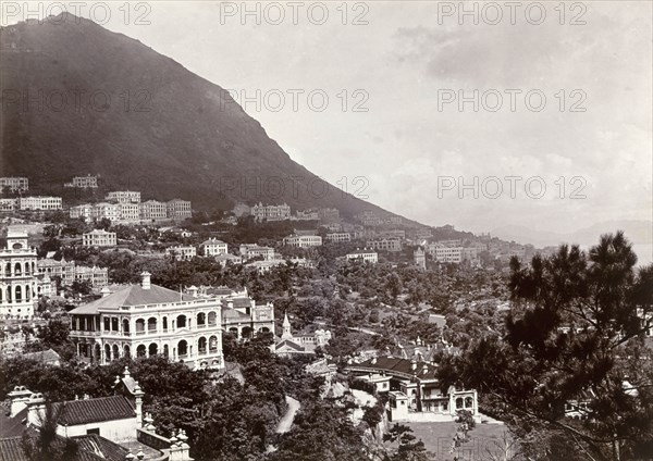 Residential area on Hong Kong Island. A view of Hong Kong, taken from Bowen Road, features a European residential quarter filled with large, multi-storey colonial houses. Hong Kong, China, circa 1903. Hong Kong, Hong Kong, China, People's Republic of, Eastern Asia, Asia.