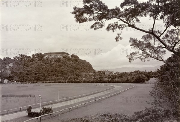 Happy Valley Horse Racing Track. View across the Happy Valley Horse Racing Track, originally built in 1845 for the entertainment of British colonists. Wan Chai, Hong Kong, China, circa 1903. Wan Chai, Hong Kong, China, People's Republic of, Eastern Asia, Asia.