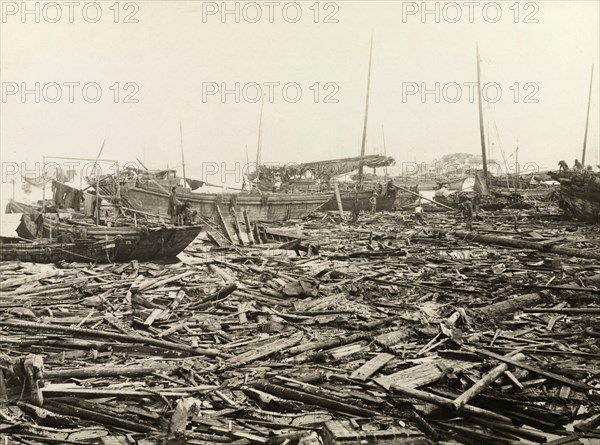 Typhoon devastation at East Point harbour. East Point harbour, swamped with debris and ship wrecks in the aftermath of a devastating typhoon that killed an estimated 10,000 people. Hong Kong, China, circa 19 September 1906., Hong Kong, China, People's Republic of, Eastern Asia, Asia.