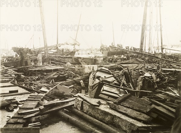 Typhoon devastation at East Point harbour. Devastation at East Point harbour, caused by a typhoon that killed an estimated 10,000 people. A mass of debris, including the wrecks of junks and sailboats, lies in a tangled heap on the harbourside. Hong Kong, China, circa 19 September 1906., Hong Kong, China, People's Republic of, Eastern Asia, Asia.