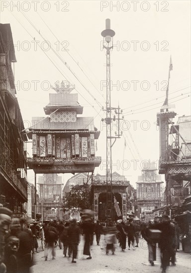 Welcome arch for the Duke of Connaught, Hong Kong. A decorative welcome arch spans a city street in honour of the Duke of Connaught, who visited Hong Kong shortly before a devastating typhoon struck the city on 18 September. Hong Kong, China, August 1906. Hong Kong, Hong Kong, China, People's Republic of, Eastern Asia, Asia.