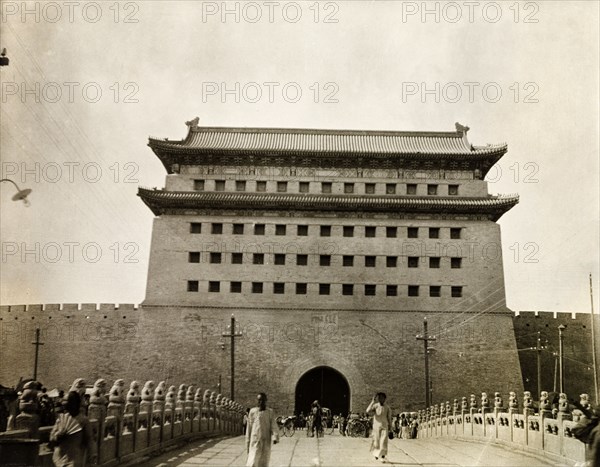 Guardhouse at Chien Men Gate, Peking. The guardhouse at Chien Men Gate, a fortified complex in the city of Peking. An example of typical Hakka architecture, the guardhouse features one entrance with no windows at ground level. Peking (Beijing), China, circa 1910. Beijing, Beijing, China, People's Republic of, Eastern Asia, Asia.