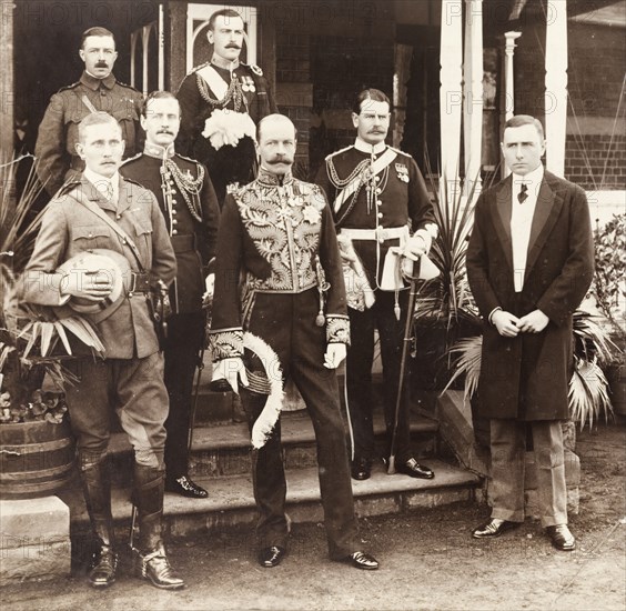 Portrait of Sir Arthur Lawley and his staff. Portrait of Sir Arthur Lawley (1860-1932), Lieutenant Governor of the Transvaal (centre), and his staff on the steps of Government House. To his right stands Major Geoffrey Glyn, his aide-de-camp, and Patrick Duncan, Treasurer for Transvaal. Pretoria, South Africa, circa 1903. Pretoria, Gauteng, South Africa, Southern Africa, Africa.