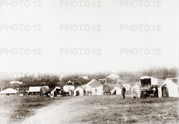 Boer evening market. Boer traders set up stalls and tents for an evening market. Pretoria, South Africa, circa 1903. Pretoria, Gauteng, South Africa, Southern Africa, Africa.
