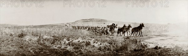 Royal entourage arriving for an ' indaba'. Labotsibeni Gwamile Mdluli, the Queen Regent of Swaziland, arrives with her entourage for an 'indaba' (council) with British officials. Near Mbabane, Swaziland, 24 August 1904. Mbabane, Hhohho, Swaziland, Southern Africa, Africa.