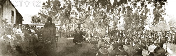 The Queen Regent of Swaziland addresses a crowd. Labotsibeni Gwamile Mdluli, the Queen Regent of Swaziland, addresses a crowd of Swazis at an 'indaba' (council) with British officials. Near Mbabane, Swaziland, 24 August 1904. Mbabane, Hhohho, Swaziland, Southern Africa, Africa.