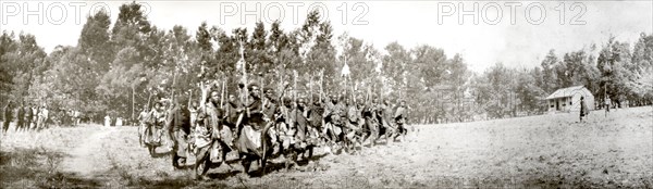 Swazi warriors perform a war dance. Swazi warriors perform a war dance for visiting British colonial administrators. Mbabane, Swaziland, 1904. Mbabane, Hhohho, Swaziland, Southern Africa, Africa.