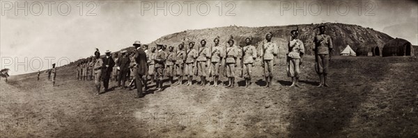 Sir Arthur Lawley inspecting Zulu Police. Sir Arthur Lawley (1860-1932), Lieutenant Governor of the Transvaal, inspects a detachment of Zulu police at Embabaan. Embabaan (Mbabane), Swaziland, circa August 1904. Mbabane, Hhohho, Swaziland, Southern Africa, Africa.