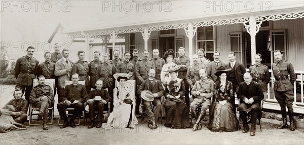 British officials in South Africa. A number of British officials line up for a group portrait. Amongst the group are Lady and Sir Arthur Lawley, Lieutenant Governor of the Transvaal, Sir Alfred and Lady Pease, and Dr Carter, the Bishop of Pretoria. Barberton, South Africa, 1904. Barberton, Mpumalanga, South Africa, Southern Africa, Africa.