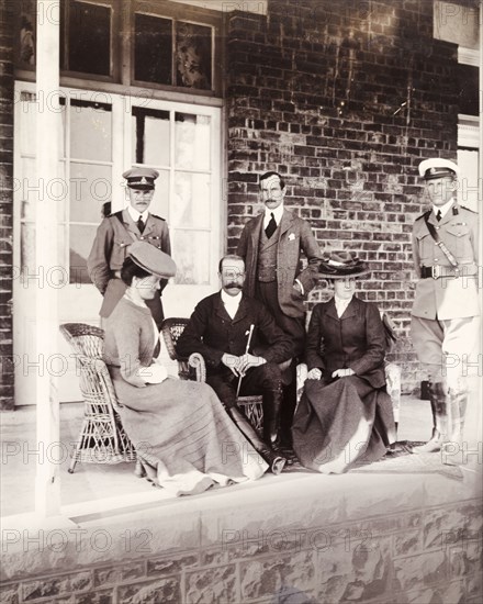 South African colonial administrators. Sir Arthur Lawley (1860-1932), Lieutenant Governor of the Transvaal, and his wife, Lady Annie Lawley, sit on a porch during their visit to Major and Mrs Bentinck. Heidelberg, Eastern Transvaal (Mpumalanga), South Africa, circa 1905. Heidelberg, Mpumalanga, South Africa, Southern Africa, Africa.