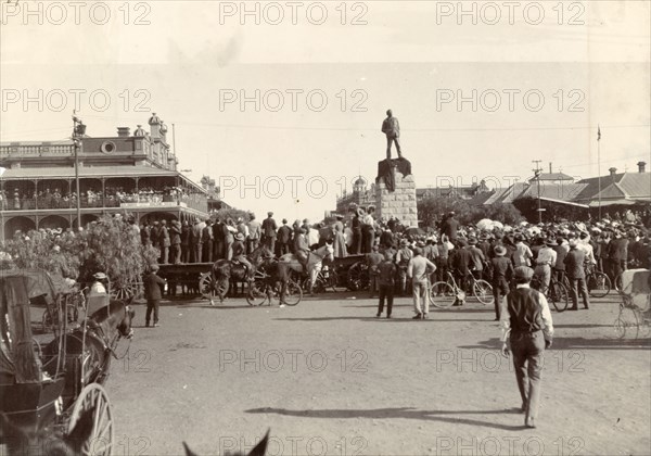 Unveiling of statue of Cecil John Rhodes. Crowds gather to see the unveiling of a commemorative statue of Cecil John Rhodes (1853-1902) by the Mayor of Bulawayo. Bulawayo, Rhodesia (Zimbabwe), 7 July 1904. Bulawayo, Zimbabwe, Southern Africa, Africa.